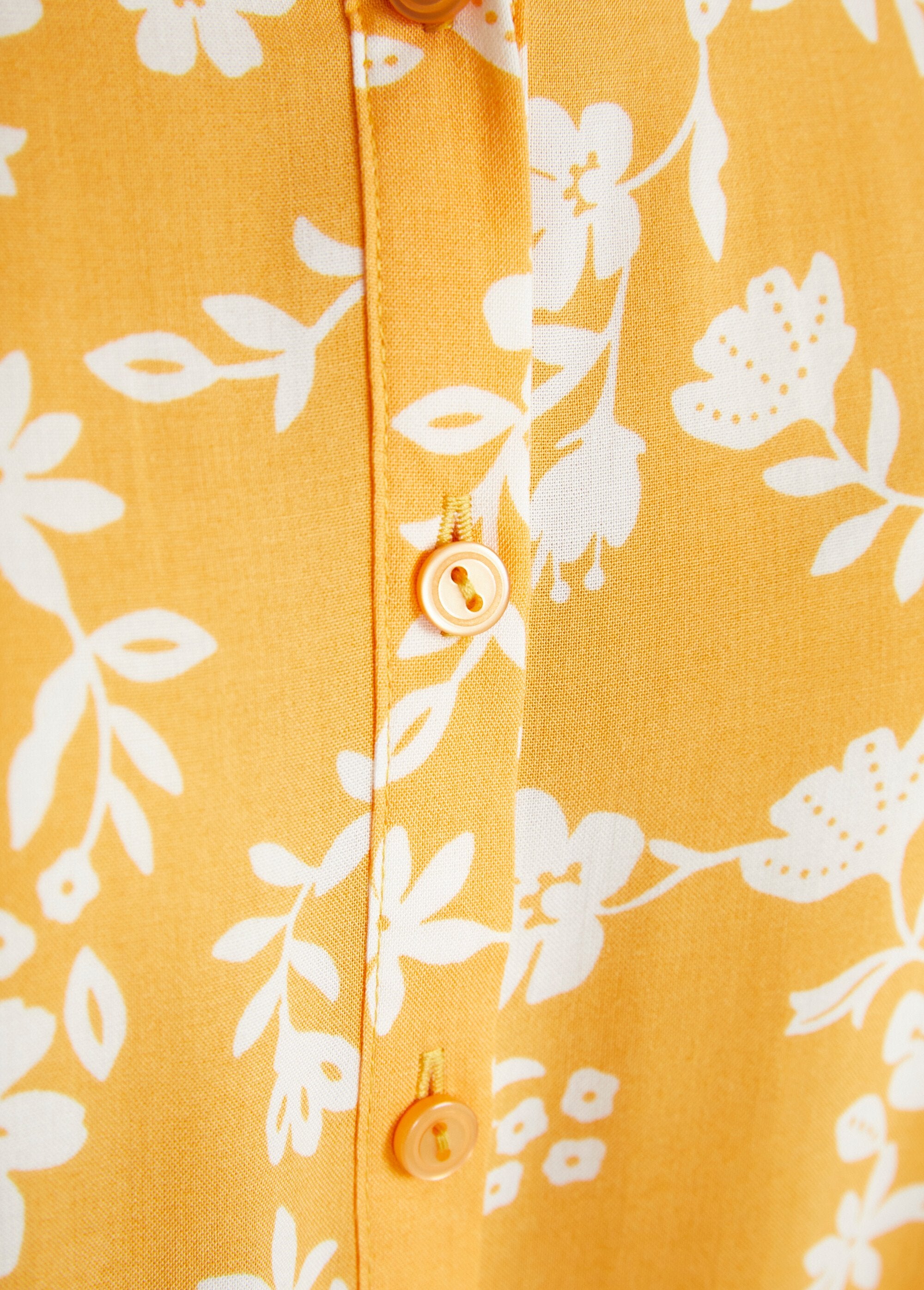 Blusa_estampada_com_manga_3/4_e_costas_mais_compridas_Jaune_et_blanc_DE3_slim