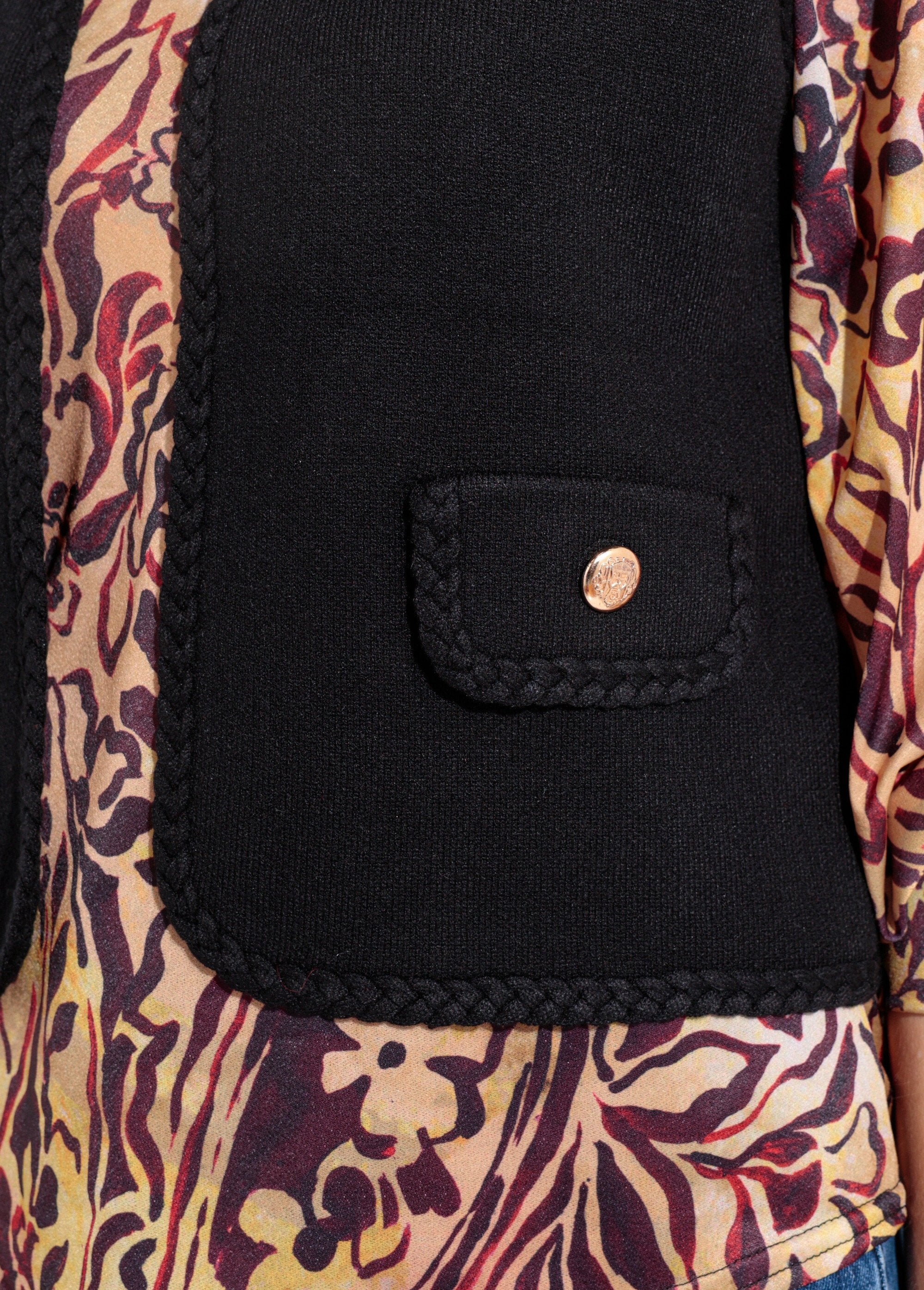 Colete_grosso_sem_mangas_com_detalhes_trançados_Noir_DE1_slim