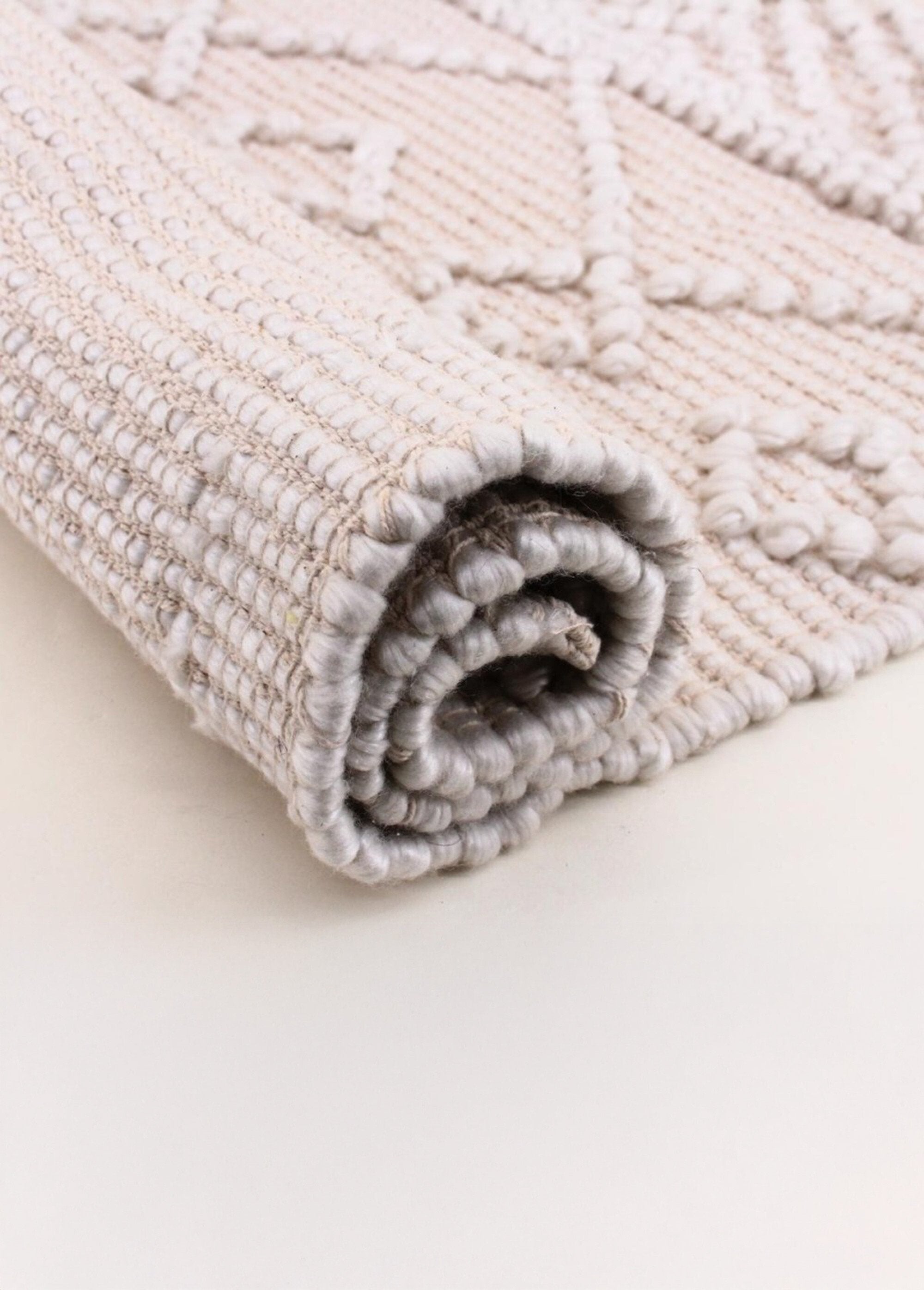 Tapete_com_relevo_e_bolas,_110x60cm_Naturel_DE1_slim