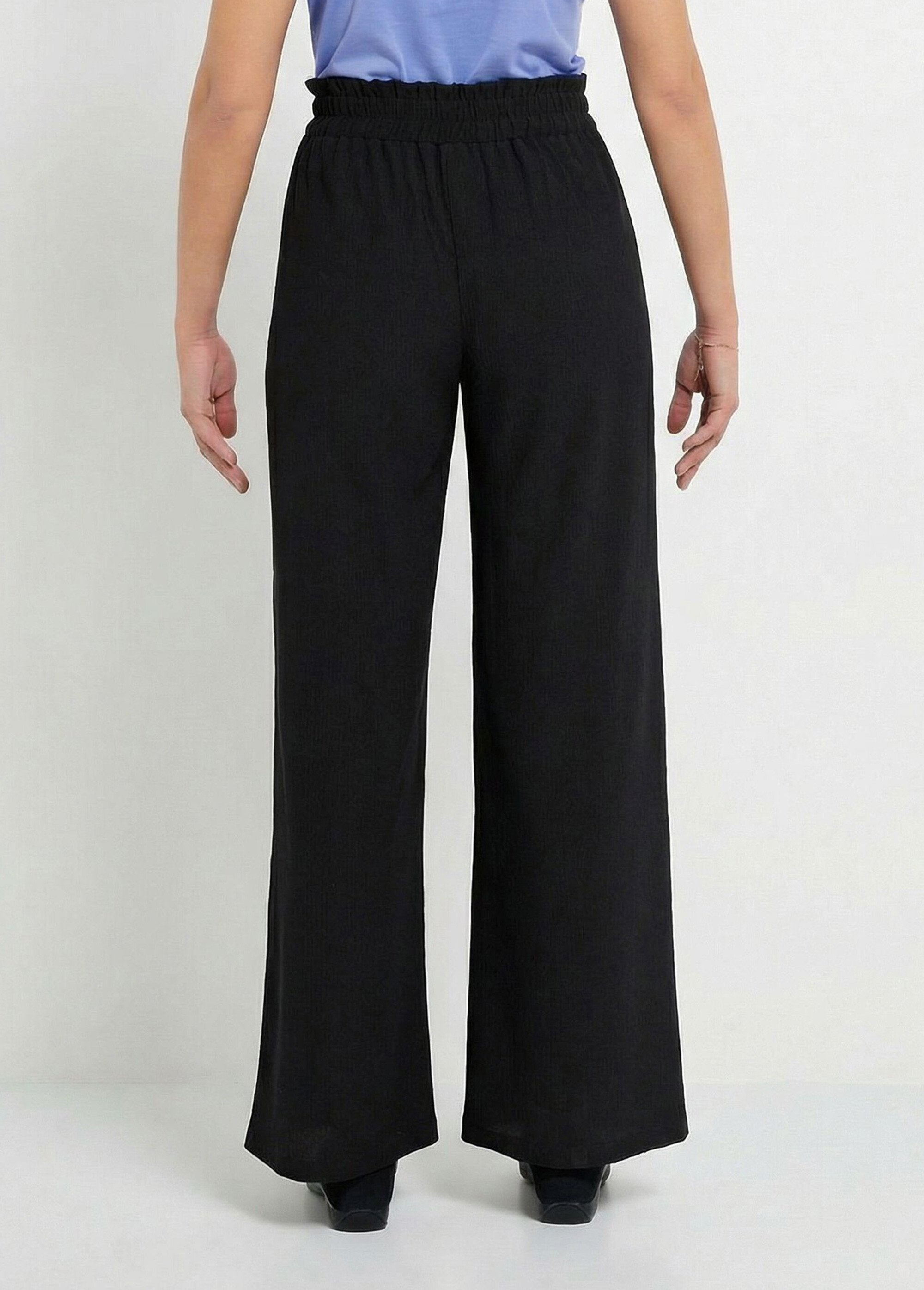 Calças_verdes_de_perna_larga_com_cintura_elástica_em_malha_de_relevo_Noir_DO1_slim