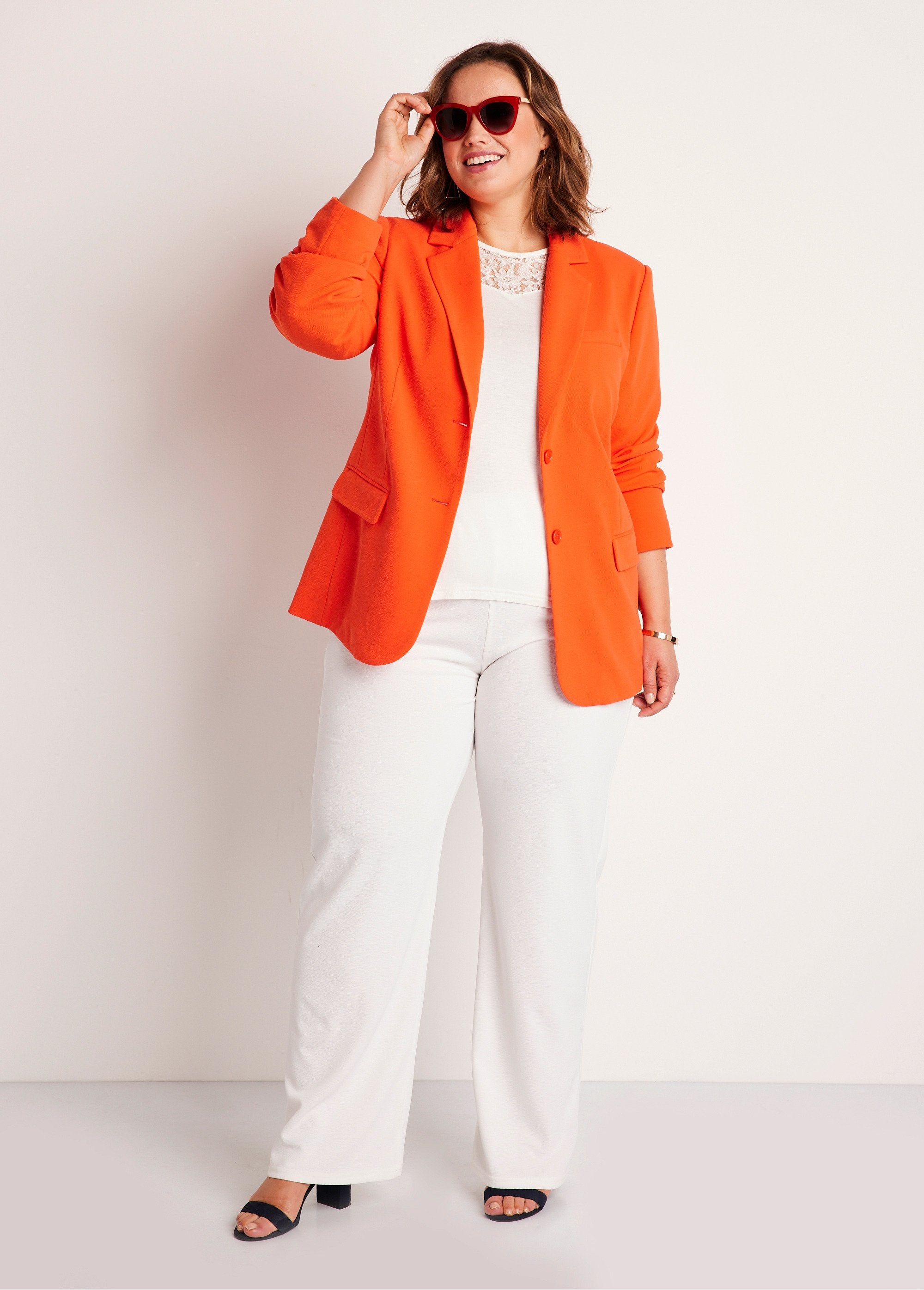 Jaqueta_blazer_de_malha_lisa_com_corte_reto_LARANJA_SF1_curvy